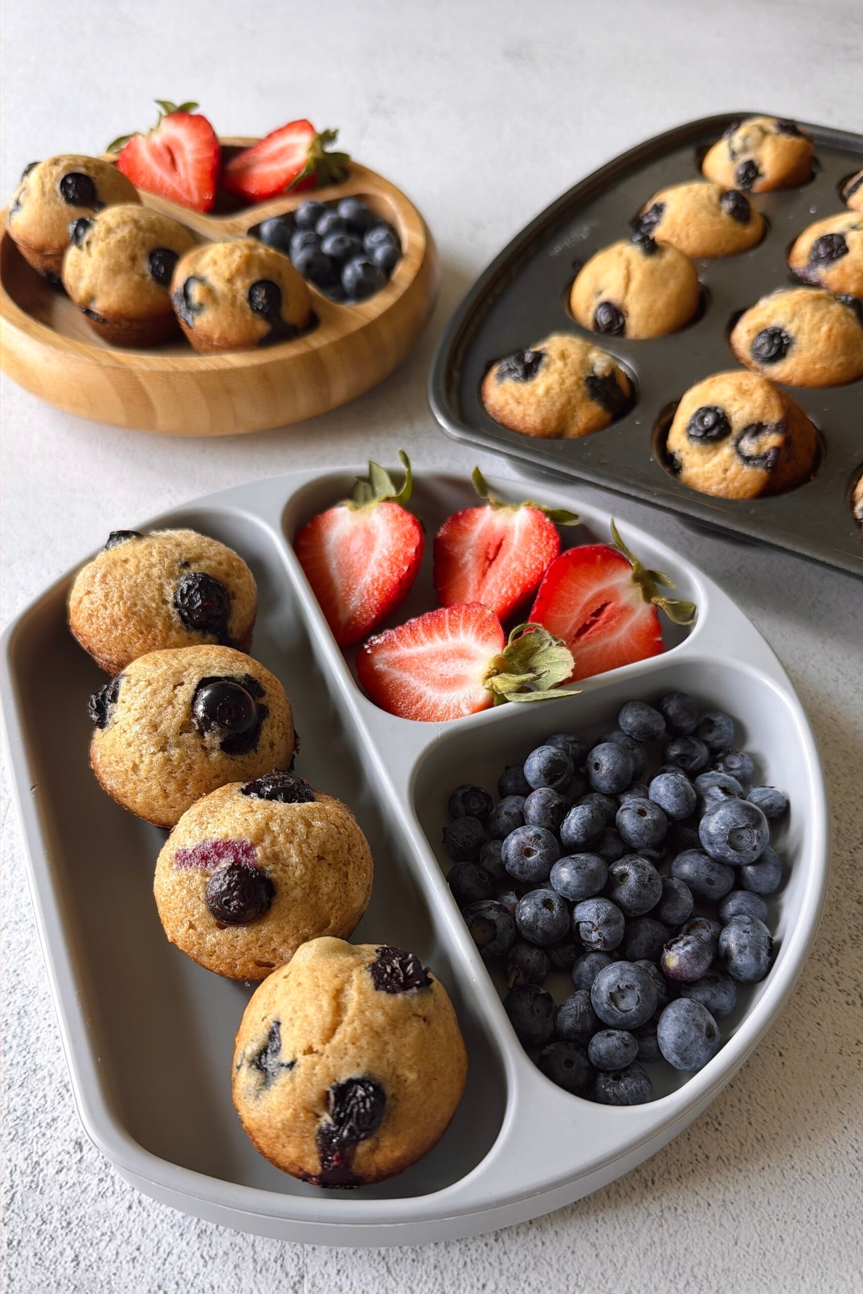 Dairy-free blueberry muffins served with berries.