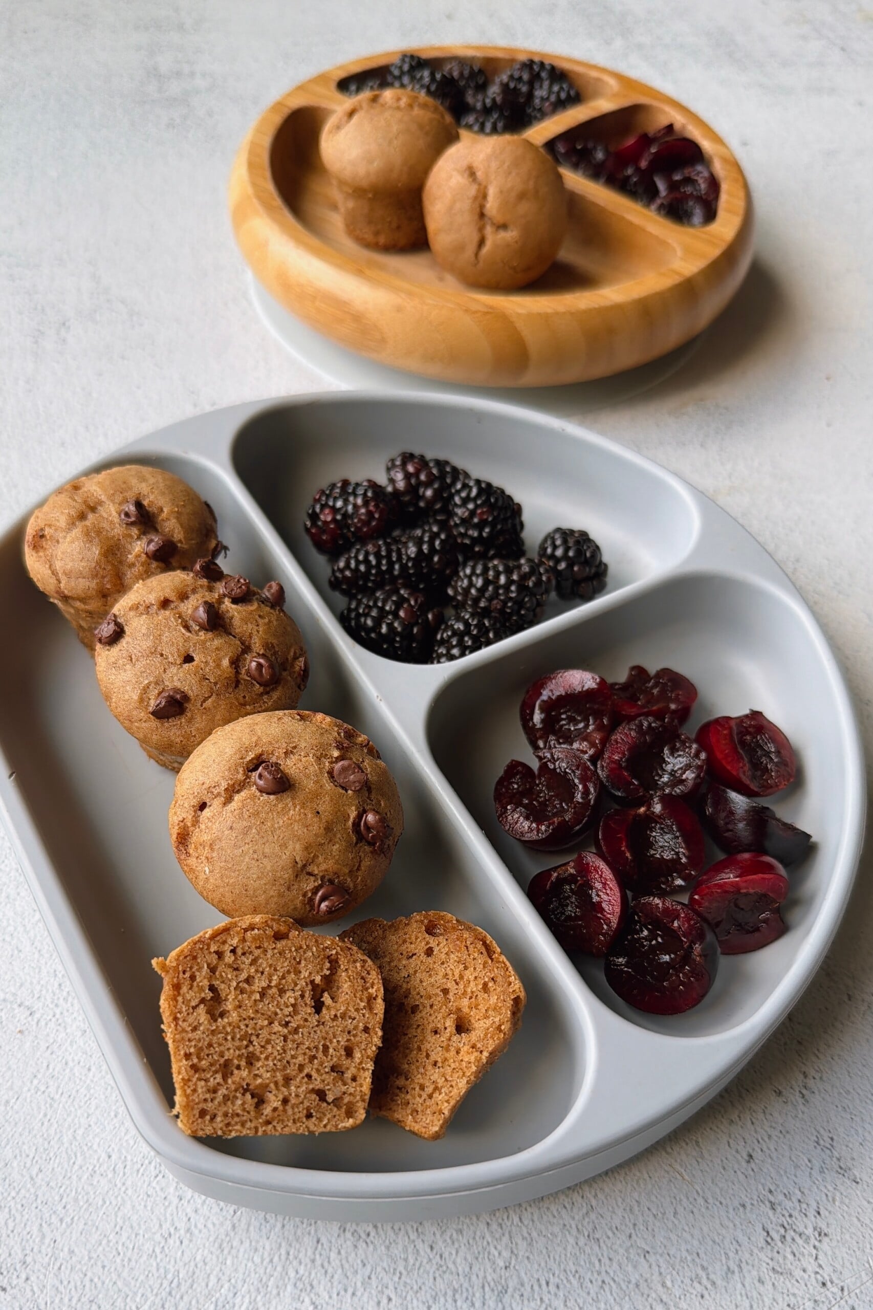 Almond butter muffins served with blackberries and cherries.
