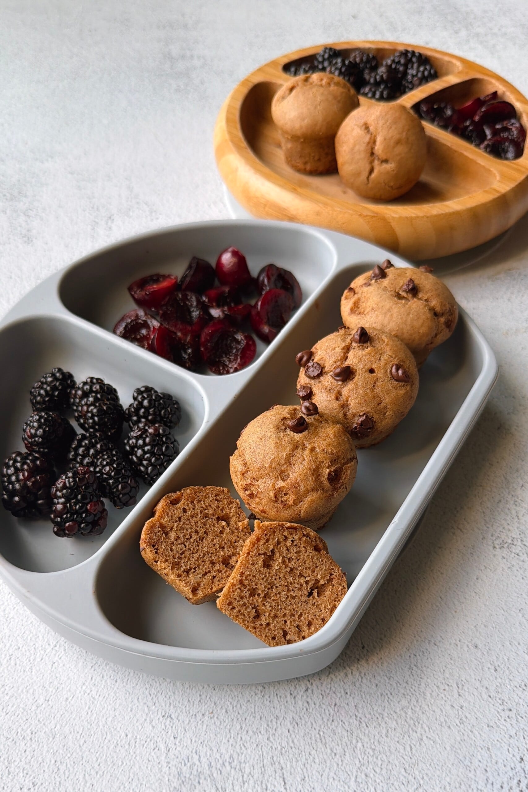Almond butter muffins served with blackberries and cherries.