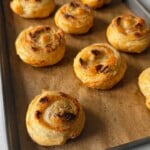 Cheese and tomato pinwheels served with broccoli and strawberries.