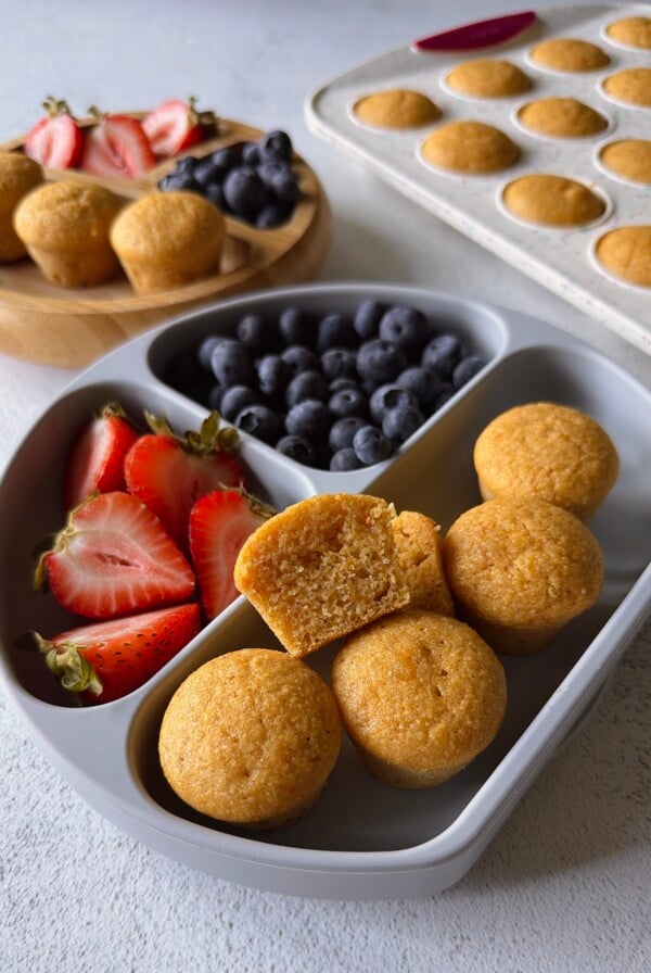 Sweet potato corn muffins served with berries.