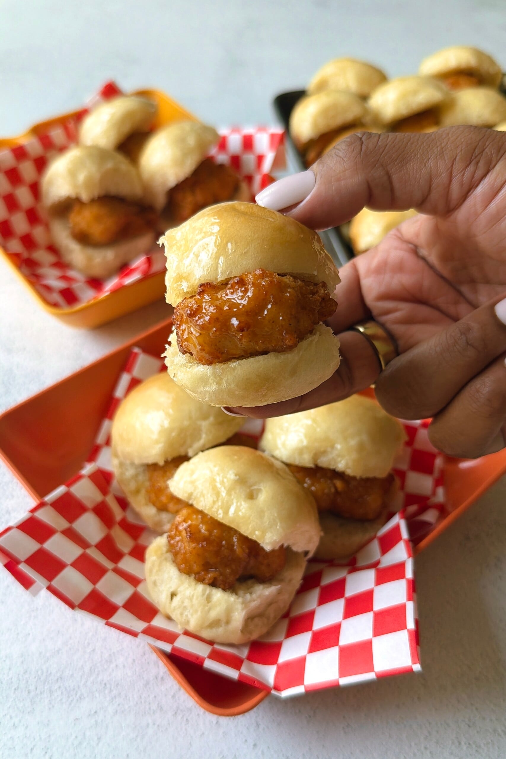 Homemade chicken minis serving with dipping sauce.