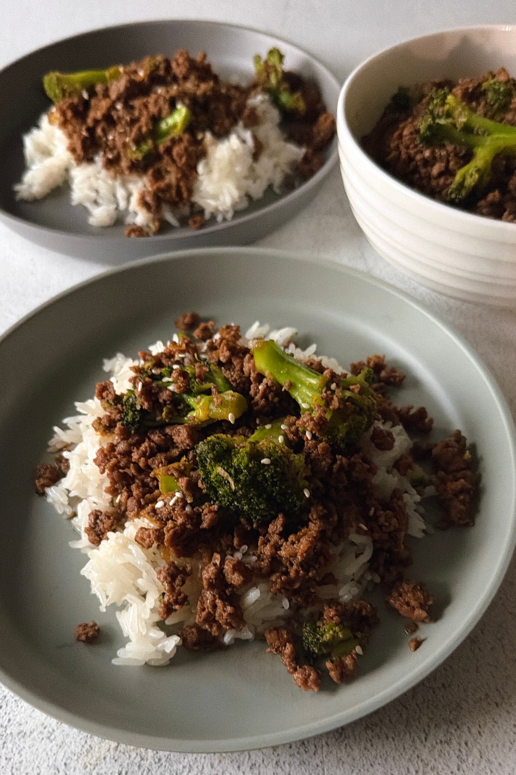 Ground beef and broccoli stir fry served with white rice.