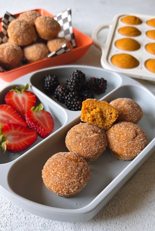 Pumpkin maple muffins served with berries.