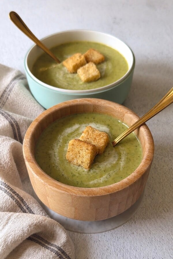 Broccolini soup served with croutons.