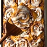 Pumpkin cinnamon roll sheet pan pancakes.