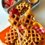 Corn dog waffles served with ketchup.
