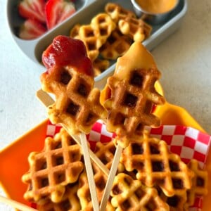 Corn dog waffles served with ketchup.