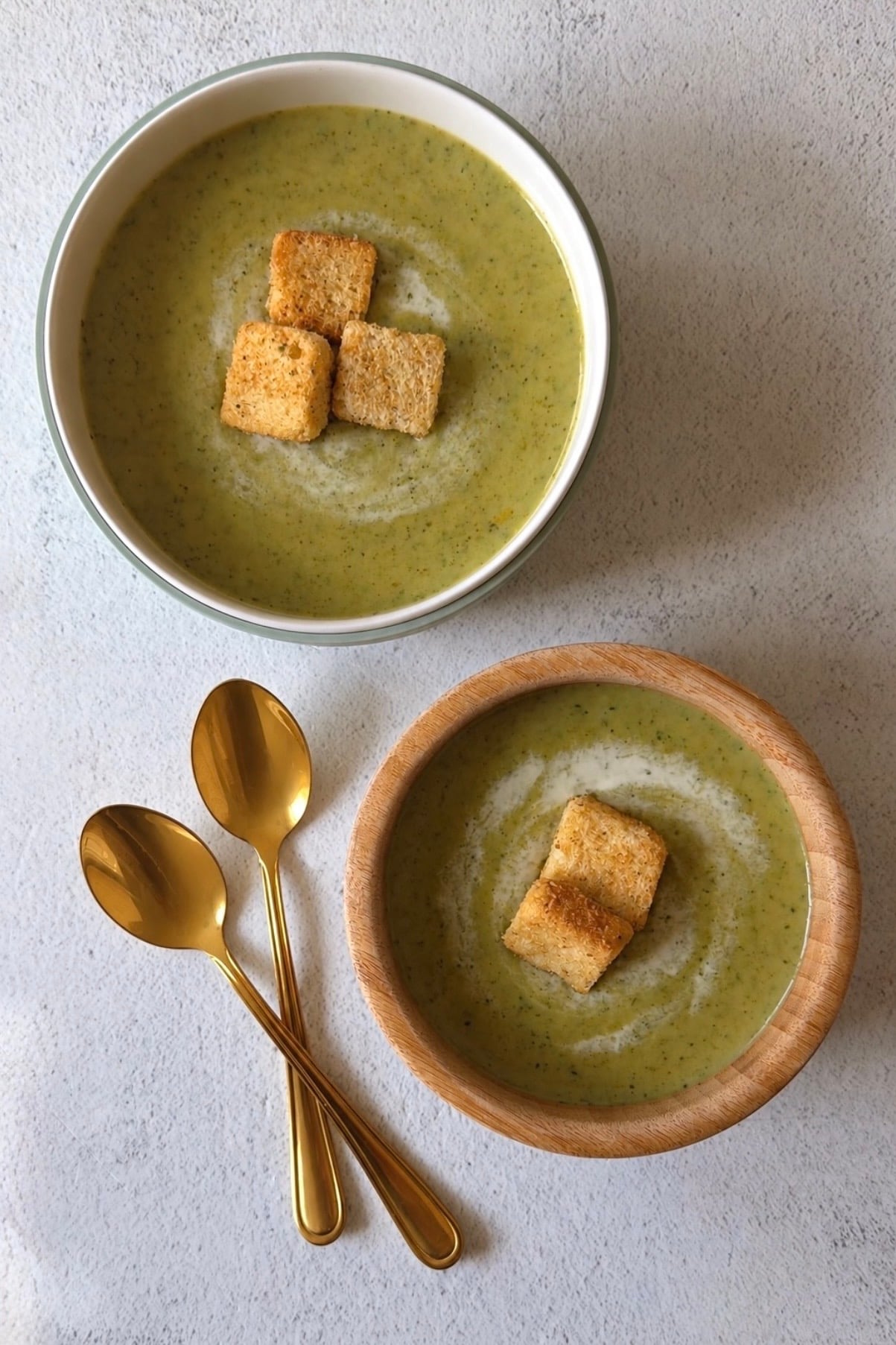 Broccolini soup served with croutons.