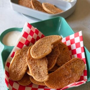 Apple pancake dippers served with strawberries and a Greek yogurt dip.