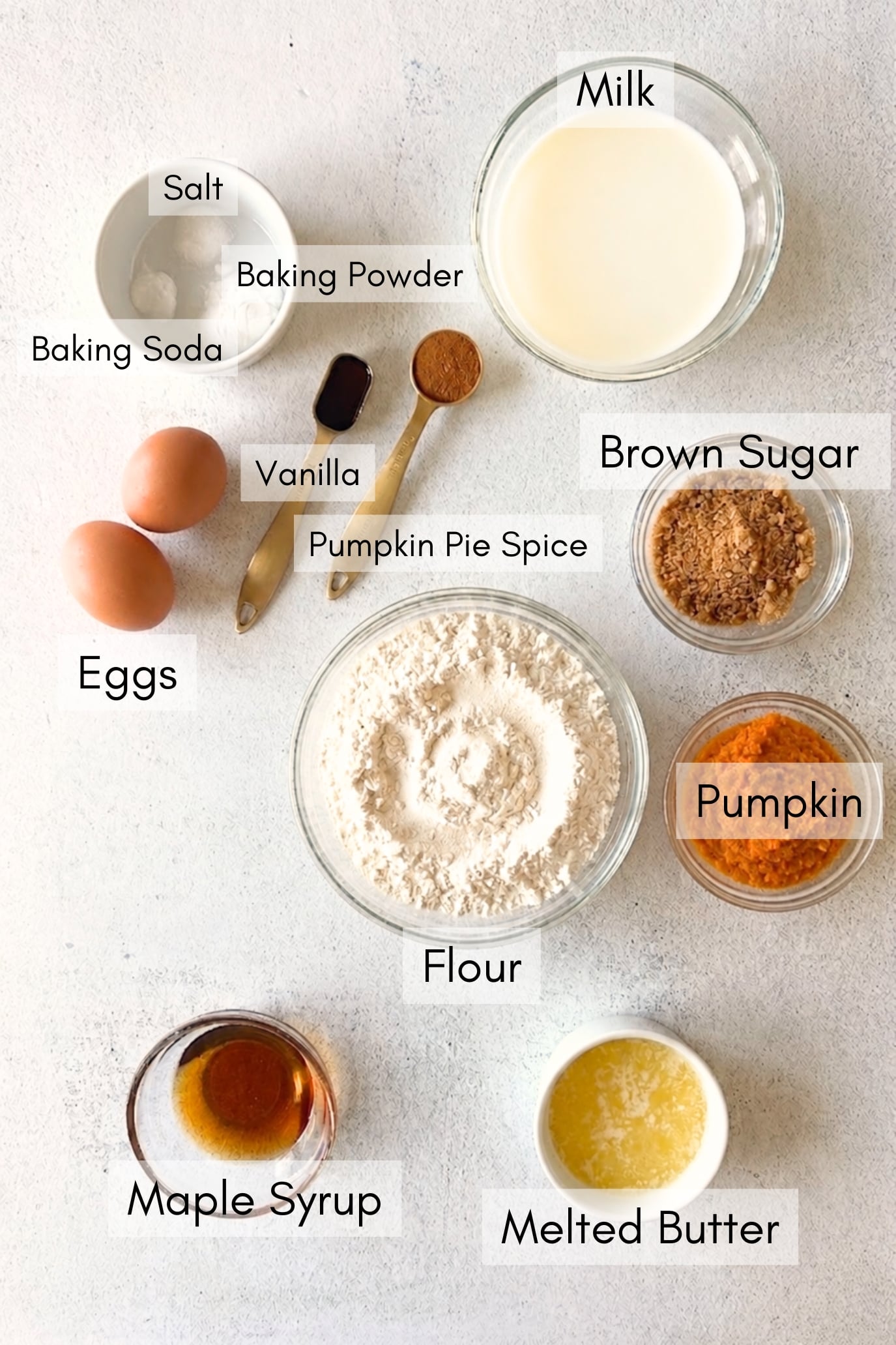 Ingredients to make pumpkin cinnamon roll pancakes.